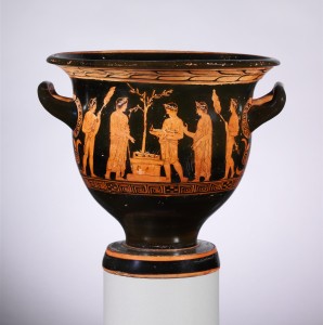 Ant indo, skirto vynui su vandeniu maišyti, vaizduojama aukojimo scena. Iš lauramedžio, pavaizduoto prie altoriaus, galima spręsti, kad aukojimas vyksta Apolono šventykloje. Iš www.metmuseum.org